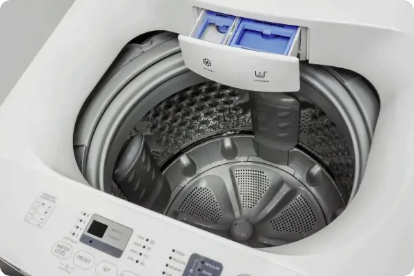 Close view inside a top-loading washing machine.