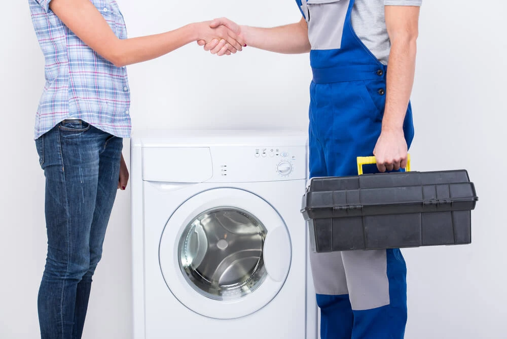 Client Shaking Hands with Service Technician Client Shaking Hands with Service Technician