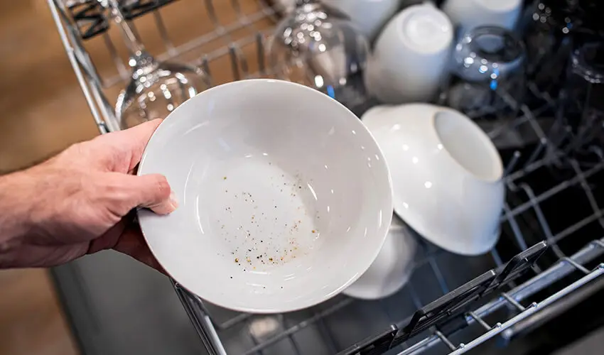 How can I get my dishwasher to clean all the cutlery properly? : r