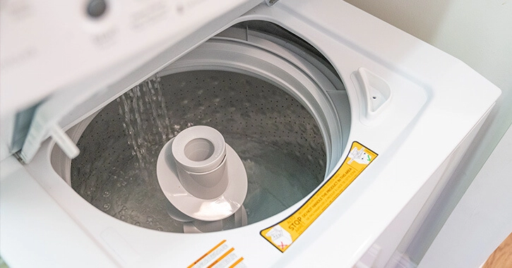 Why Is Water Sitting in the Bottom of the Washing Machine?